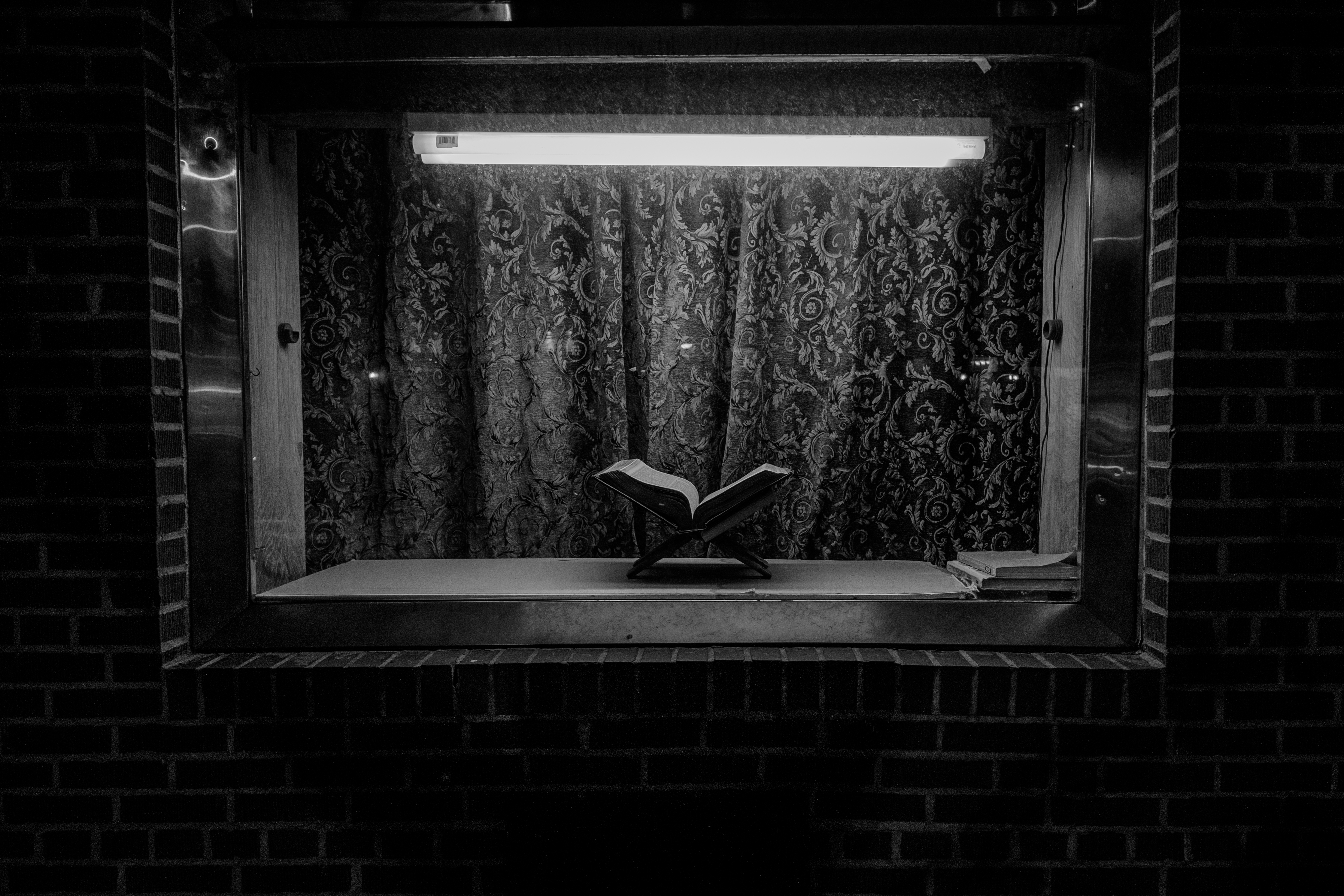 bible-display-window-night-brooklyn-black-and-white-photography